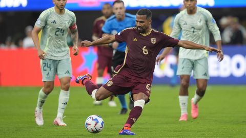 Venezuela's Yangel Herrera strikes the ball during a Copa America Group B soccer match against Mexico, Wednesday, June 26, 2024, in Inglewood, Calif. (AP Photo/Ryan Sun)