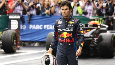 Red Bull driver Sergio Perez of Mexico walks in the pit area after clocking the third fastest time during qualification ahead of the Formula One Grand Prix at the Spa-Francorchamps racetrack in Spa, Belgium, Saturday, July 27, 2024. The Belgian Formula One Grand Prix will take place on Sunday. (AP Photo/Geert Vanden Wijngaert)