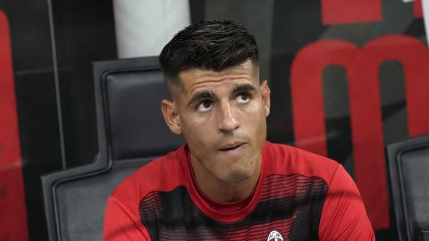 AC Milan's Alvaro Morata sits in the bench prior to the start of the Serie A soccer match between AC Milan and Torino at the San Siro stadium, in Milan, Italy, Saturday, Aug. 17, 2024. (AP Photo/Antonio Calanni)