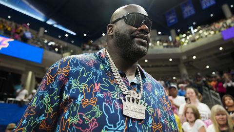 Former NBA player Shaquille O'Neal watches warmups before a WNBA basketball game between the Indiana Fever and the Chicago Sky, Friday, Aug. 30, 2024, in Chicago. (AP Photo/Erin Hooley)