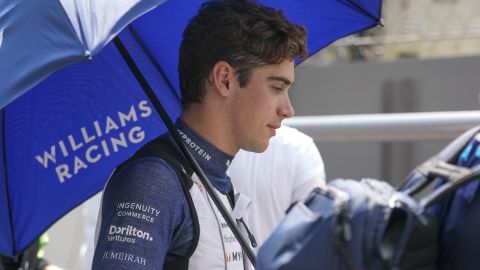 Williams driver Franco Colapinto of Argentina walks to the starting grid before before the Formula One Italian Grand Prix race at the Monza racetrack, in Monza, Italy, Sunday, Sept. 1, 2024. (AP Photo/Luca Bruno)