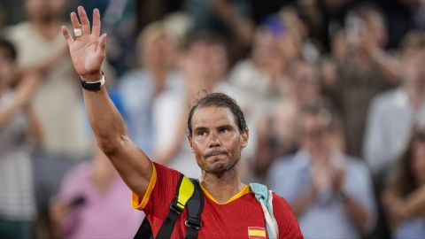 FILE - Rafael Nadal reacts waves after the men's doubles quarter-final tennis competition at the Roland Garros stadium, at the 2024 Summer Olympics, July 31, 2024, in Paris, France. (AP Photo/Manu Fernandez, file)