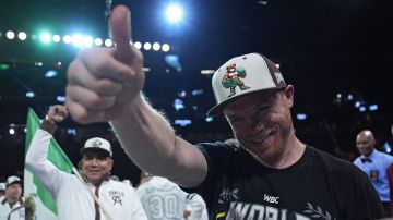 Canelo Alvarez celebrates after defeating Edgar Berlanga in a super middleweight title bout Saturday, Sept. 14, 2024, in Las Vegas. (AP Photo/John Locher)