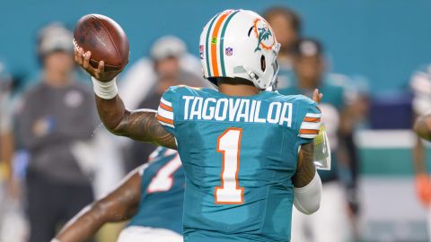 Miami Dolphins quarterback Tua Tagovailoa (1) throws the ball during an NFL football game against the Buffalo Bills, Thursday, Sept. 12, 2024, in Miami Gardens, Fla. (AP Photo/Doug Murray)