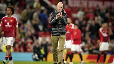 Manchester United's head coach Erik ten Hag celebrates with supporters after winning the English League Cup soccer match between Manchester United and Barnsley at Old Trafford, Manchester, England, Tuesday, Sept. 17, 2024. (AP Photo/Dave Thompson)