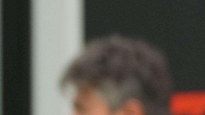 Williams driver Franco Colapinto of Argentina arrives for the first practice session of the Singapore Formula One Grand Prix at the Marina Bay Street Circuit, in Singapore, Friday, Sept. 20, 2024. (AP Photo/Vincent Thian)