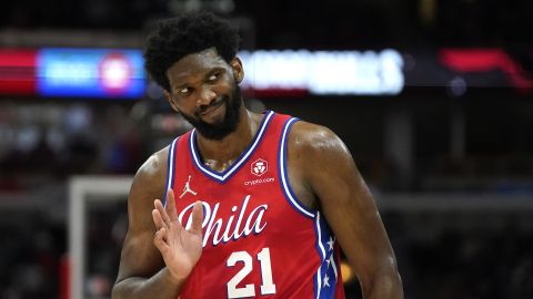 FILE - Philadelphia 76ers' Joel Embiid waves to Chicago Bulls fans after hitting a 3-point shot late in the second half of the team's NBA basketball game against the Bulls of Saturday, Nov. 6, 2021, in Chicago. (AP Photo/Charles Rex Arbogast, File)