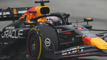 Red Bull driver Max Verstappen of the Netherlands steers his car during the third practice session of the Singapore Formula One Grand Prix at the Marina Bay Street Circuit, in Singapore, Saturday, Sept. 21, 2024. (AP Photo/Vincent Thian)