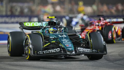 Aston Martin driver Fernando Alonso of Spain steers his car during the Singapore Formula One Grand Prix at the Marina Bay Street Circuit, in Singapore, Sunday, Sept. 22, 2024. (AP Photo/Vincent Thian)