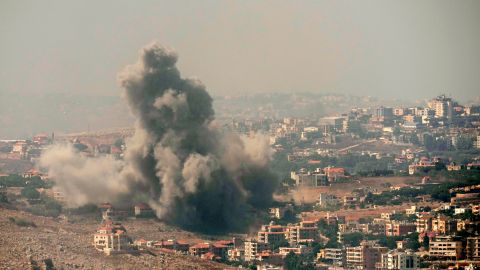 Smoke rises from Israeli airstrikes in the southern village of Kfar Rouman, seen from Marjayoun, south Lebanon, Wednesday, Sept. 25, 2024. (AP Photo/Hussein Malla)