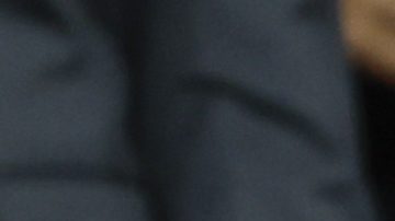 Wojciech Szczesny, centre, a new goalkeeper for Barcelona is on stands during the Champions League soccer match between Barcelona and Young Boys at the Lluis Companys Olympic Stadium in Barcelona, Spain, Tuesday, Oct. 1, 2024. (AP Photo/Joan Monfort)