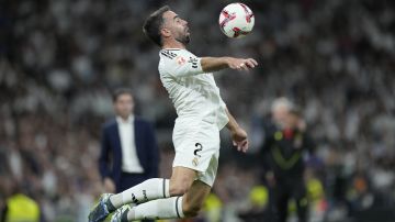 Real Madrid's Dani Carvajal receives the ball during the La Liga soccer match between Real Madrid and Villareal in Madrid, Spain, on Saturday, Oct. 5, 2024. (AP Photo/Bernat Armangue)