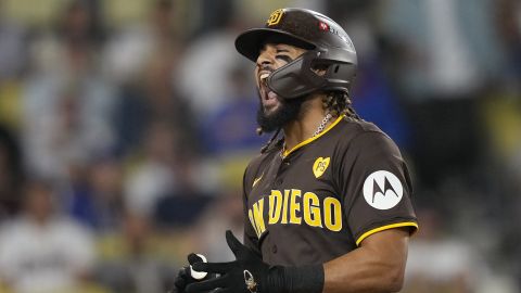 San Diego Padres' Fernando Tatis Jr. reacts as he reaches home plate after a solo home run during the ninth inning in Game 2 of a baseball NL Division Series against the Los Angeles Dodgers, Sunday, Oct. 6, 2024, in Los Angeles. (AP Photo/Mark J. Terrill)