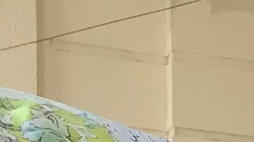 Supporters of slain Mayor Alejandro Arcos place candles and flowers at the entrance of the municipal building one week after he took office in Chilpancingo, Mexico, Monday, Oct. 7, 2024. (AP Photo/Alejandrino Gonzalez)