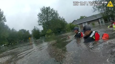 This image taken from Deland Police bodycam shows DeLand police and fire crews conduct water rescues after Hurricane Milton on Thursday, Oct. 10, 2024 in DeLand, Fla. (City of DeLand, Fla., via AP)