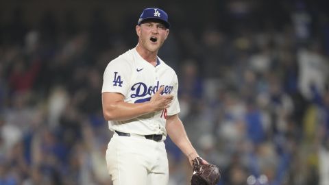 Los Angeles Dodgers relief pitcher Ben Casparius celebrates after their win against the New York Mets in Game 1 of a baseball NL Championship Series, Sunday, Oct. 13, 2024, in Los Angeles. (AP Photo/Ashley Landis)