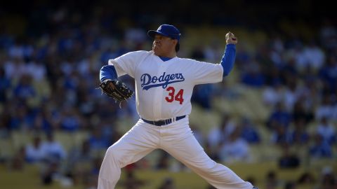 FILE - Fernando Valenzuela throws to the plate during the Old-Timers baseball game, June 8, 2013, in Los Angeles. Fernando Valenzuela, the Mexican-born phenom for the Los Angeles Dodgers who inspired “Fernandomania” while winning the NL Cy Young Award and Rookie of the Year in 1981, has died Tuesday, Oct. 22, 2024. (AP Photo/Mark J. Terrill, File)