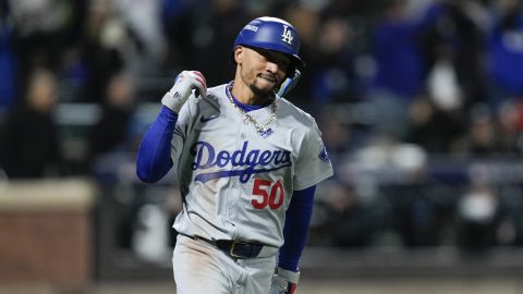 Los Angeles Dodgers' Mookie Betts celebrates after a two-run home run against the New York Mets during the sixth inning in Game 4 of a baseball NL Championship Series, Thursday, Oct. 17, 2024, in New York. (AP Photo/Ashley Landis)