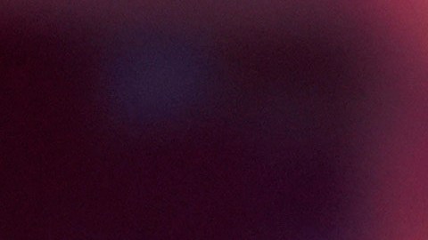 Republican presidential nominee former President Donald Trump watches as a video featuring Democratic presidential nominee Vice President Kamala Harris plays during a campaign event, Friday, Oct. 18, 2024 in Detroit. (AP Photo/Evan Vucci)