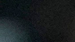 Inter Miami forward Lionel Messi (10) kicks the ball to score a goal as New England Revolution defender Xavier Arreaga, left, defends during the second half of an MLS soccer match, Saturday, Oct. 19, 2024, in Fort Lauderdale, Fla. (AP Photo/Lynne Sladky)