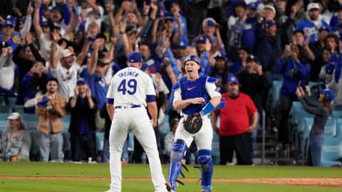 Los Angeles Dodgers pitcher Blake Treinen and catcher Will Smith celebrate their win against the New York Mets in Game 6 of a baseball NL Championship Series, Sunday, Oct. 20, 2024, in Los Angeles. The Dodgers will face the New York Yankees in the World Series. (AP Photo/Mark J. Terrill)