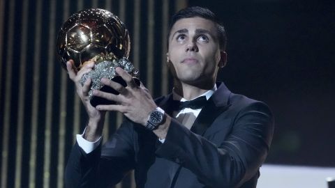 Manchester City's Spanish player Rodri receives the 2024 Men's Ballon d'Or award during the 68th Ballon d'Or (Golden Ball) award ceremony at Theatre du Chatelet in Paris, Monday, Oct. 28, 2024. (AP Photo/Michel Euler)