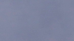 Rain clouds hover over the downtown skyline as a storm approaches Wednesday, March 10, 2021, in Los Angeles. (AP Photo/Marcio Jose Sanchez)
