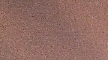 FILE - In this Wednesday, June 16, 2021, file photo, a skateboarder is silhouetted as he jumps high at the skateboard park during sunset in the Venice Beach section of Los Angeles. The Southwest U.S. continued to bake Saturday, June 19, and weather forecasters kept warnings in effect for excessive heat in Arizona, Nevada and desert areas, at least through the weekend. (AP Photo/Ringo H.W. Chiu, File)