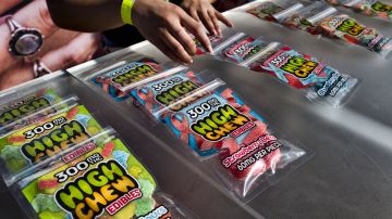 In this Saturday, Oct. 20, 2018 photo medicated High Chew edibles are shown on display and offered for sale at the cannabis-themed Kushstock Festival at Adelanto, Calif. (AP Photo/Richard Vogel)