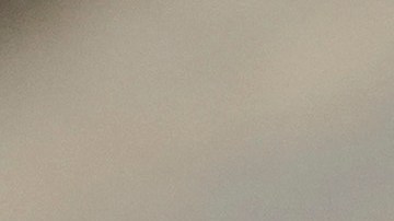 A relative shows golden jewelry that was confiscated by Nazi Germans from Zofia Strusińska and her sister Józefa Skórka, who were captured by Nazi troops during Warsaw Uprising in 1944 and taken to a forced labor camp. Their seized items that had been stored at Germany's Arolsen Archives, were returned to their relatives in a ceremony in Warsaw, Poland, on Tuesday, Sept. 10, 2024, in which 10 other families also had belongings of their relatives returned. (AP Photo/Czarek Sokolowski)