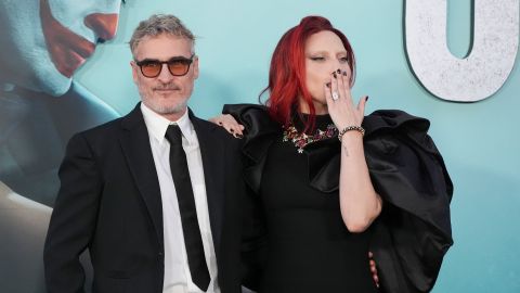 Joaquin Phoenix, left, and Lady Gaga arrive at the premiere of "Joker: Folie a Deux" on Monday, Sept. 30, 2024, at TCL Chinese Theatre in Los Angeles. (Photo by Jordan Strauss/Invision/AP)