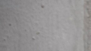 Relatives of inmates reach through a prison fence as they stand to see their family members during a protest rally against prison abuse in Tbilisi, Georgia, Friday, Sept. 21, 2012. Thousands rallied Friday in Georgia to demand the prosecution of top officials fired in a prison abuse scandal that threatens to unseat the governing pro-Western party in the country's Oct. 1 parliamentary election. (AP Photo/Shakh Aivazov)