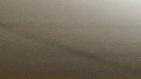 FILE - Election worker Donna Young inspects a mail-in ballot for damage at the Sacramento County Registrar of Voters in Sacramento, Calif., June 3, 2022. (AP Photo/Rich Pedroncelli, File)