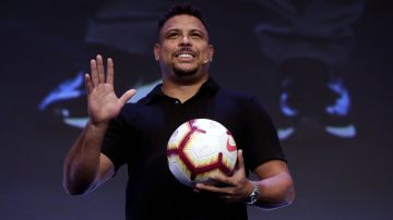 FILE - In this Tuesday, Sept. 25, 2018 file photo, former Brazilian soccer star Ronaldo Luis Nazario waves to the crowd before a conference of the World Football summit in Madrid, Spain. Former France international Hatem Ben Arfa has signed with struggling Spanish club Valladolid. The former France international extended his much traveled and turbulent career on Tuesday, Jan. 28, 2020 by signing a contract with Valladolid, the Spanish soccer club where former Brazil striker Ronaldo is the main shareholder. (AP Photo/Manu Fernandez, File)