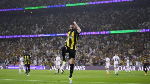 Al Ittihad's Karim Benzema celebrates after scoring their side's third goal during the Soccer Club World Cup first round soccer match between Al Ittihad and Auckland City FC at King Abdullah Sports City stadium in Jeddah, Saudi Arabia, Tuesday, Dec. 12, 2023. Benzema scored once in Al Ittihad's 3-0 victory. (AP Photo/Manu Fernandez)