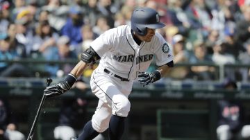 FILE - Seattle Mariners' Ichiro Suzuki heads to first base after hitting a single against the Cleveland Indians during the third inning of a baseball game March 31, 2018, in Seattle. Suzuki headlines the group of players who are eligible for Hall of Fame voting a year from now. That ballot is also expected to include Cy Young Award winners CC Sabathia and Félix Hernández — and the final chance for reliever Billy Wagner, who fell five votes short this time.(AP Photo/Ted S. Warren, File)