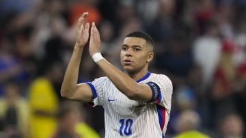 Kylian Mbappe of France reacts after losing a semifinal match between Spain and France at the Euro 2024 soccer tournament in Munich, Germany, Tuesday, July 9, 2024. (AP Photo/Antonio Calanni)