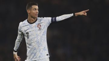 Portugal's Cristiano Ronaldo reacts during the UEFA Nations League soccer match between Scotland and Portugal at Hampden Park in Glasgow, Scotland, Tuesday, Oct. 15, 2024. (AP Photo/Scott Heppell)