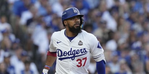 Los Angeles Dodgers left fielder Teoscar Hernández bats against the New York Yankees during the first inning in Game 2 of the baseball World Series, Saturday, Oct. 26, 2024, in Los Angeles. (AP Photo/Godofredo A. Vásquez)
