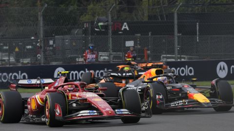 Carlos Sainz, of Spain, steers his Ferrari followed by Red Bull driver Max Verstappen of the Netherlands during the Formula One Mexico Grand Prix auto race at the Hermanos Rodriguez racetrack in Mexico City, Sunday, Oct. 27, 2024. (AP Photo/Moises Castillo)