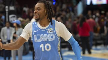 Cleveland Cavaliers' Darius Garland (10) smiles after an NBA basketball game against the Charlotte Hornets in Cleveland, Sunday, Nov 17, 2024. (AP Photo/Phil Long)