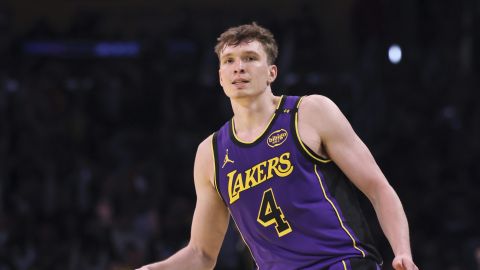 Los Angeles Lakers guard Dalton Knecht celebrates after scoring a 3-pointer during the second half of an Emirates NBA Cup basketball game against the Utah Jazz, Tuesday, Nov. 19, 2024, in Los Angeles. (AP Photo/Etienne Laurent)