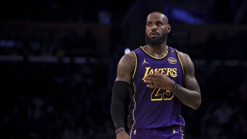 Los Angeles Lakers forward LeBron James reacts during the second half of an Emirates NBA Cup basketball game against the Utah Jazz, Tuesday, Nov. 19, 2024, in Los Angeles. (AP Photo/Etienne Laurent)