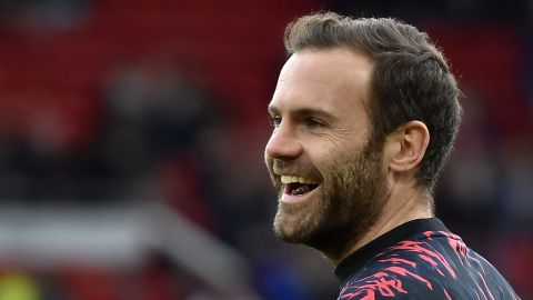 FILE - Manchester United's Juan Mata smiles during the warm up before the English Premier League soccer match between Manchester United and Tottenham Hotspur, at the Old Trafford stadium in Manchester, England, March 12, 2022. (AP Photo/Rui Vieira, File)