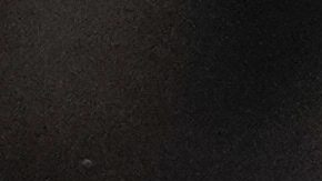 Bayern's Harry Kane celebrates after scoring the opening goal with the penalty kick during the Bundesliga soccer match between Bayern Munich and Augsburg at the Allianz Arena in Munich, Germany, Friday, Nov. 22, 2024. (AP Photo/Matthias Schrader)