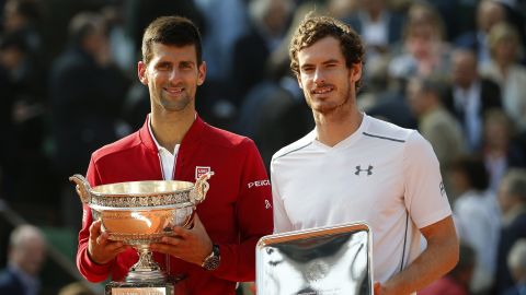 FILE - Serbia's Novak Djokovic, left, and Britain's Andy Murray holds their trophy after their final match of the French Open tennis tournament at the Roland Garros stadium, Sunday, June 5, 2016 in Paris. (AP Photo/Alastair Grant, File)