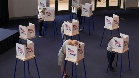 Voters work on their ballots at a polling place at the Ronald Reagan Presidential Library on Election Day, Tuesday, Nov. 5, 2024, in Simi Valley, Calif. (AP Photo/Chris Pizzello)