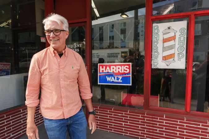 Los Angeles County District Attorney George Gascon arrives at a campaign event for his reelection at the Magnificent Brothers Barber & Beauty Salon in Los Angeles on Saturday, Oct. 26, 2024. (AP Photo/Damian Dovarganes)