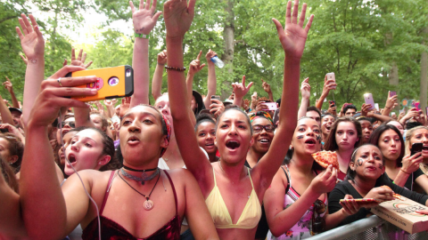 Concert goers enjoy the sights and sounds of the 2015 Sweetlife Festival at Merriweather Post Pavilion on Sunday, May 31, 2015, in Columbia, Md. (Photo by Owen Sweeney/Invision/AP)