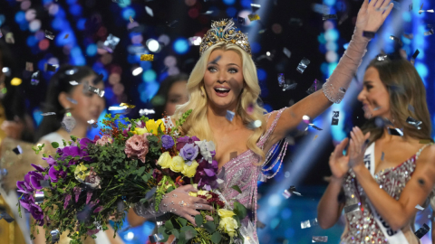 Miss Denmark Victoria Kjær Theilvig waves after winning the 73rd Miss Universe Beauty Pageant in Mexico City, Saturday, Nov. 16, 2024. (AP Photo/Fernando Llano)